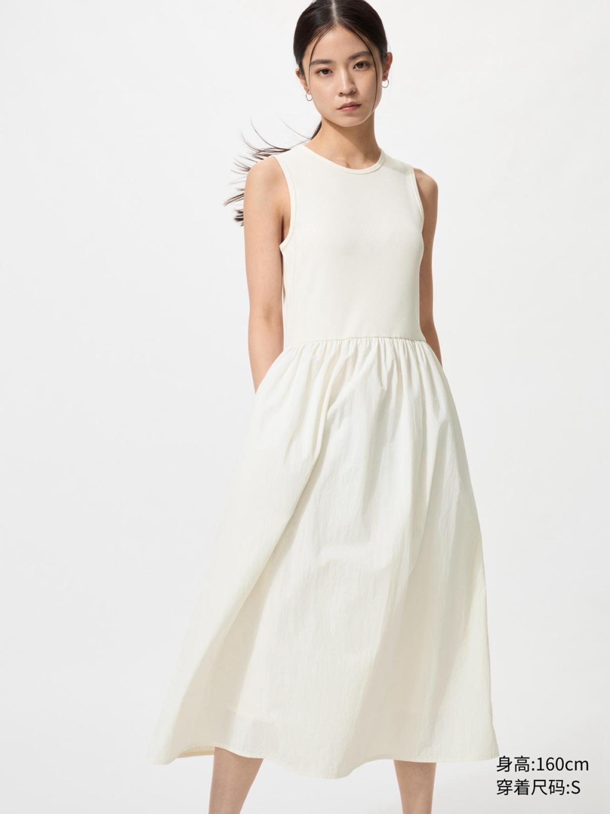Приталенное платье без рукавов